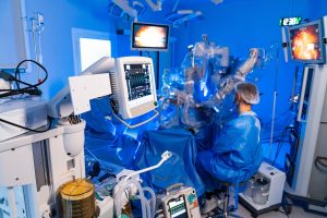 Robotic surgery operating room overview. Advanced surgical robotics and team in clinical environment