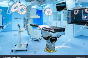 stock-photo-equipment-and-medical-devices-in-hybrid-operating-room-blue-filter-surgical-procedures-the-672030043.jpg